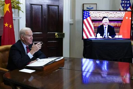 President Joe Biden meets virtually with Chinese President Xi Jinping from the Roosevelt Room of the White House in Washington, on Nov. 15, 2021. Biden's administration is taking stock of a newly empowered Xi Jinping as the Chinese president begins a third, norm-breaking five-year term as Communist Party leader. With U.S.-Chinese relations already fraught, concerns are growing in Washington that more difficult days may still lay ahead. (AP Photo/Susan Walsh, File)