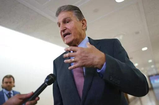 Sen. Joe Manchin, D-W.Va., speaks to reporters outside the hearing room where he chairs the Senate Committee on Energy and Natural Resources, at the Capitol in Washington, July 19, 2022. Manchin announced Wednesday, July 27, that he had reached an expansive agreement with Senate Majority Leader Chuck Schumer which had eluded them for months on health care costs, energy and climate issues, taxing higher earners and large corporations and reducing federal debt. (AP Photo/J. Scott Applewhite, File)