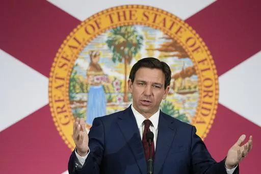 Florida Gov. Ron DeSantis speaks during a news conference, May 9, 2023, in Miami. On Saturday, Aug. 26, DeSantis declared a state of emergency for most of Florida's Gulf coast as forecasters say a weather system off the coast of Mexico could soon become a tropical storm and start moving toward the area. (AP Photo/Rebecca Blackwell, File)