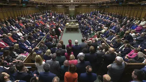 In this image taken from video lawmakers gather in the House of Commons, London, Tuesday July 9, 2024, as Parliament returned. Hundreds of newly elected lawmakers are gathering in Britain's Parliament after the election that brought a Labour government to power. Among the 650 members of the House of Commons, 335 are arriving for the first time. (House of Commons/UK Parliament via AP)