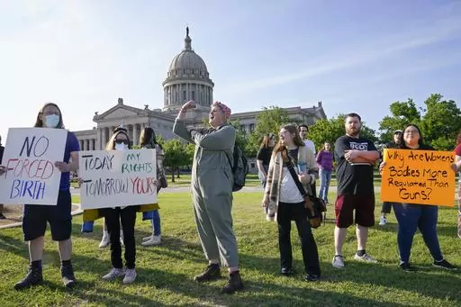 Abortion-rights supporters rally at the State Capitol on May 3, 2022, in Oklahoma City. A divided Oklahoma Supreme Court on Tuesday, March 21, 2023, overturned a portion of the state’s near total ban on abortion, ruling women have a right to abortion when pregnancy risks their health, not just in a medical emergency. (AP Photo/Sue Ogrocki, File)