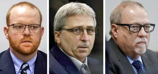 This photo combo shows, from left to right, Travis McMichael, William "Roddie" Bryan, and Gregory McMichael during their trial at at the Glynn County Courthouse in Brunswick, Ga. Months after they were sentenced to life in prison for murder, the three white men who chased and killed Ahmaud Arbery in a Georgia neighborhood faced a second round of criminal penalties Monday, Aug. 8, 2022, for federal hate crimes committed in the deadly pursuit of the 25-year-old Black man. (Pool via AP, File)