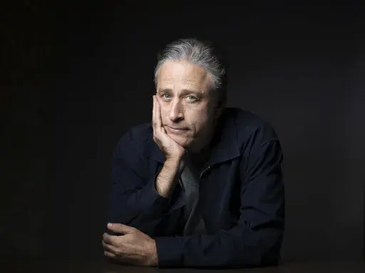 Jon Stewart poses for a portrait in promotion of his film, "Rosewater," in New York, Nov. 7, 2014. Stewart is returning to “The Daily Show” as an occasional host and executive producing through the 2024 U.S. elections cycle, starting Feb. 12. (Photo by Victoria Will/Invision/AP, File)
