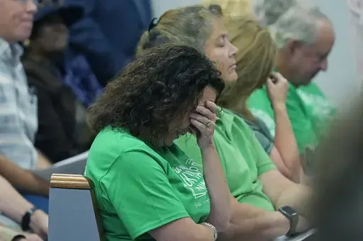 Residents of rural Hinds County, Miss., express their disappointment with the county's Board of Supervisors approving what could become the state's largest solar energy project, over their objections, Monday, June 17, 2024, in Jackson, Miss. (AP Photo/Rogelio V. Solis)