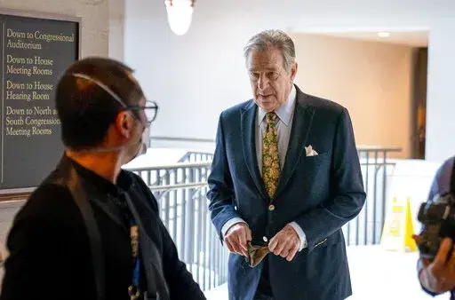 Paul Pelosi, right, the husband of House Speaker Nancy Pelosi, of California, follows his wife as she arrives for her weekly news conference on Capitol Hill in Washington, Thursday, March 17, 2022. Authorities say Paul Pelosi was arrested on suspicion of DUI in Northern California, late Saturday, May 28, 2022, in Napa County. He could face charges including driving under the influence. Bail was set at $5,000. (AP Photo/Andrew Harnik, File)