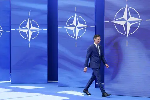 Spain's Prime Minister Pedro Sanchez arrives to pose for photos with NATO Secretary General Jens Stoltenberg at the NATO summit at NATO headquarters in Brussels, Monday, June 14, 2021. Russia’s invasion of Ukraine is certain to dominate an upcoming NATO summit in Madrid. But host nation Spain and other members are quietly pushing the Western alliance to consider how mercenaries aligned with Russian President Vladimir Putin are spreading Moscow’s influence in Africa. (AP Photo/Patrick Semansk