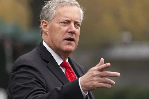 Then-White House chief of staff Mark Meadows speaks with reporters at the White House, Oct. 21, 2020, in Washington. The prosecutor who's investigating whether Donald Trump and his allies illegally tried to influence the 2020 election in Georgia is seeking to compel testimony from more allies of the former president, including Meadows and lawyer Sidney Powell. (AP Photo/Alex Brandon)