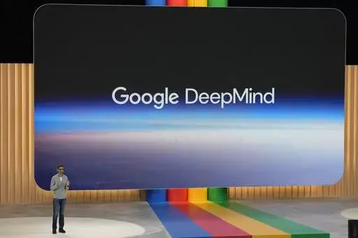 Alphabet CEO Sundar Pichai speaks about Google DeepMind at a Google I/O event in Mountain View, Calif., Wednesday, May 10, 2023. Google on Thursday, Feb. 7, 2024, introduced a free artificial intelligence app that will implant the technology on smartphones to enable people to quickly connect to a digital brain that can write for them, interpret what they're reading and seeing in addition to helping manage their lives. (AP Photo/Jeff Chiu, File)