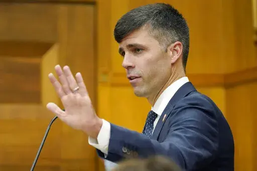 Mississippi Solicitor General Scott Stewart, seen in this July 5, 2022, photo in state chancery court, argued before a federal appeals court on Oct. 5, 2022, in favor of limiting the federal government’s ability to sue states over their mental health systems. A Justice Department attorney said the federal government has the power to enforce the Americans with Disabilities Act. (AP Photo/Rogelio V. Solis, File)