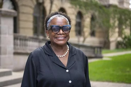 Kathleen McElroy poses Tuesday, June 13, 2023, in College Station, Texas. Texas A&M University reached a $1 million settlement Thursday, Aug. 3, 2023, with McElroy, a Black journalism professor, after botched attempts to hire her unraveled after pushback over her past work promoting diversity. (Meredith Seaver/College Station Eagle via AP, File)