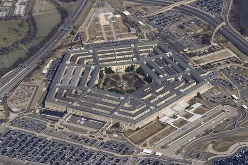 The Pentagon is seen from Air Force One as it flies over Washington, March 2, 2022. A fake image purportedly showing an explosion near the Pentagon has been widely shared on social media, sending a brief shiver through the stock market. But police and fire officials in Arlington, Va., said Monday, May 22, 2023, that the image isn't real and there was no incident at the U.S. Department of Defense headquarters. (AP Photo/Patrick Semansky, File)