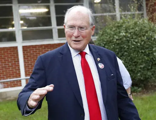 Former Mississippi Supreme Court Chief Justice Bill Waller Jr. speaks on Aug. 27, 2019, at his Jackson, Miss., voting precinct. Waller announced Monday, Jan. 30, 2023, that he would not run for governor again this year. (AP Photo/Rogelio V. Solis, File)