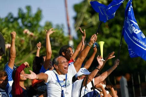 Supporters of opposition candidate for governor, Sergio Garrido, rally in Barinas, Venezuela, Jan. 6, 2022. Voters in the home state of Venezuela’s late President Hugo Chávez on Jan. 6, picked Garrido in a closely watched special election called after the contender representing that faction in November’s regular contest was retroactively disqualified as he was ahead in the vote count. (AP Photo/Matias Delacroix, File)