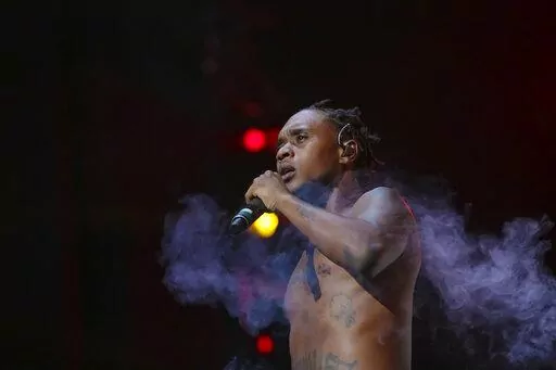 Rapper Slim Jxmmi, of Rae Sremmurd, performs on stage during the Dazed and Blazed Summer 2018 Tour at Jiffy Lube Live on Thursday, Aug. 9, 2018, in Bristow, Va. Rapper Slim Jxmmi was arrested in Miami early Tuesday, Jan. 25, 2022, after attacking the mother of his young child during an argument, police said. Aaquil Brown, who performs under the name Slim Jxmmi in the hip hop duo Rae Sremmurd, faces a misdemeanor battery charge. (Photo by Brent N. Clarke/Invision/AP, File)