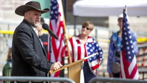 In this April 3, 2021, file photo, Ammon Bundy speaks to a crowd of about 50 followers in front of the Ada County Courthouse in downtown Boise, Idaho. A major Boise hospital was locked down for about an hour after far-right activist Bundy urged supporters to head there to protest a child protection case involving a family friend. St. Luke's Health System put the Boise Medical Center on lockdown Tuesday, March 15, 2022. (Darin Oswald/Idaho Statesman via AP, File)