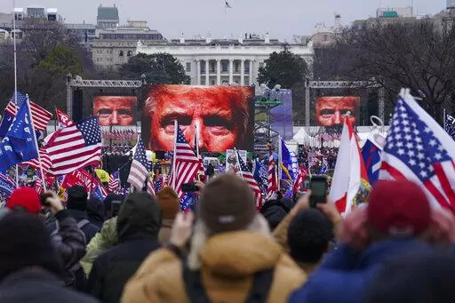 Supporters of President Donald Trump supporters attend a rally near the White House in Washington, on Jan. 6, 2021. An original script for Donald Trump’s speech the day after the Capitol insurrection included lines asking the Justice Department to “ensure all lawbreakers are prosecuted to the fullest extent of the law’ and stating the rioters “do not represent me,” but those references were deleted and never spoken, according to exhibits released by House investigators on Monday.  (AP 