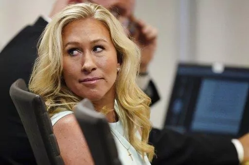 FILE-U.S. Rep. Marjorie Taylor Greene sits in a courtroom, Friday, April 22, 2022, in Atlanta. .(AP Photo/John Bazemore, Pool, File)