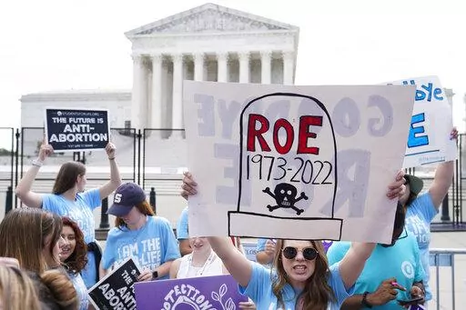 Demonstrators protest about abortion outside the Supreme Court in Washington, June 24, 2022. Nothing has undermined the GOP's momentum more than the Supreme Court's stunning decision to end abortion protections, which triggered a swift backlash even in the reddest of red states over the summer. (AP Photo/Jacquelyn Martin, File)