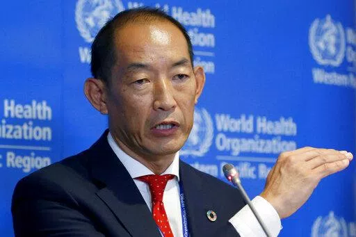 FILE – World Health Organization Regional Director for Western Pacific Takeshi Kasai addresses the media at the start of the five-day annual session Monday, Oct. 7, 2019, in Manila, Philippines. Kasai has been indefinitely removed from his post, according to internal correspondence Friday, Aug. 26, 2022, obtained by the Associated Press. (AP Photo/Bullit Marquez, File)
