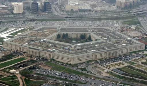This March 27, 2008, file photo, shows the Pentagon in Washington. The U.S. Army is slashing the size of its force by about 24,000, which is nearly 5%. It's also restructuring it to be better able to fight the next major war. The changes come as the Army struggles with recruiting shortfalls that have made it impossible to bring in enough soldiers to fill all the jobs. (AP Photo/Charles Dharapak, File)