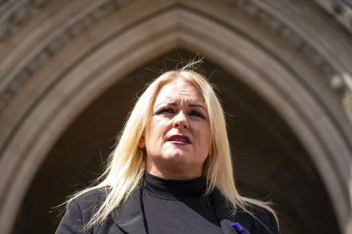 The mother of Archie Battersbee, Hollie Dance, speaks to the media outside the Royal Courts of Justice, London, Monday, July 25, 2022. The parents of a 12-year-old boy in Britain who was left in a comatose state after suffering “catastrophic” brain damage have lost a court appeal to stop doctors from ending life support for their son. Three Court of Appeal judges delivered a ruling about what was in the best interests of Archie Battersbee, who was found unconscious at home on April 7. (Domin