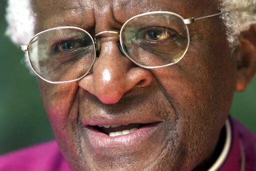 FILE - Anglican Archbishop Emeritus Desmond Tutu, speaks during an interview with the Associated Press in Pretoria, South Africa, Friday, March 21, 2003. Tutu, South Africa’s Nobel Peace Prize-winning activist for racial justice and LGBT rights and retired Anglican Archbishop of Cape Town, has died at the age of 90, South African President Cyril Ramaphosa has announced. (AP Photo/Themba Hadebe, File)