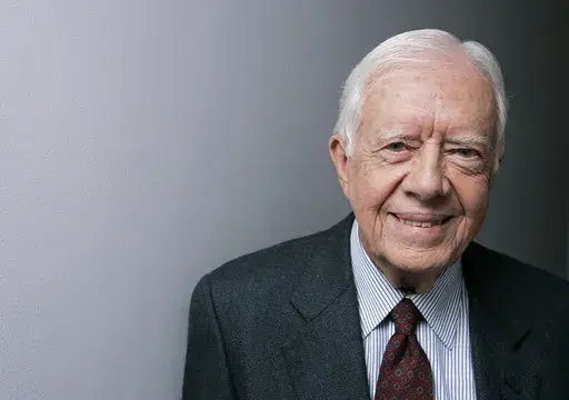 Former President Jimmy Carter poses for a portrait during the Toronto International Film Festival, Sept. 10, 2007, in Toronto. (AP Photo/Carolyn Kaster, File)