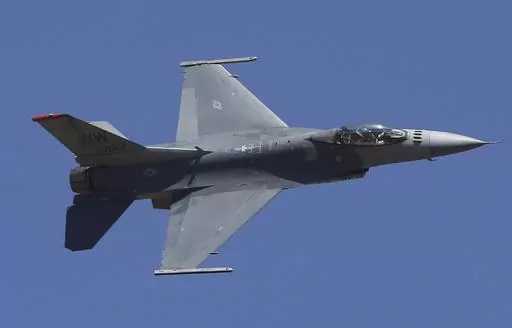 U.S. fighter aircraft F-16 performs aerobatic maneuvers on the last day of Aero India 2019 at Yelahanka air base in Bangalore, India, Feb. 24, 2019. The U.S. has once again buckled under pressure from European allies and Ukraine's leaders and agreed to provide more sophisticated weapons to the war effort. This time it's all about F-16 fighter jets. (AP Photo/Aijaz Rahi, File)
