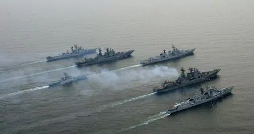 FILE- Russian and Indian warships take part in joint naval exercises near the Russia's Pacific port of Vladivostok, about 6,400 km (4,000 miles) east of Moscow, April 26, 2007. India considers Russia a time-tested ally from the Cold War era with key cooperation in defense, oil, nuclear energy and space exploration. But that partnership has become fraught since Moscow started developing closer ties with India's main rival, China, because of the war against Ukraine. (AP Photo, File)