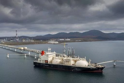 The tanker Sun Arrows loads its cargo of liquefied natural gas from the Sakhalin-2 project in the port of Prigorodnoye, Russia, on Oct. 29, 2021. The United States unleashed some of its toughest actions against Russian President Vladimir Putin right after he rolled his troops into Ukraine. Polls show people want the U.S. to do more. (AP Photo/File)