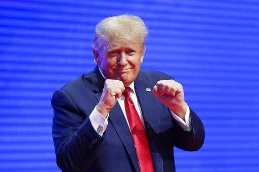 Former President Donald Trump, acknowledges supports after speaking at the Conservative Political Action Conference (CPAC) Saturday, Feb. 26, 2022, in Orlando, Fla. (AP Photo/John Raoux)