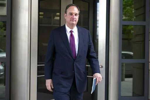Attorney Michael Sussmann leaves federal court in Washington, April 27, 2022. A criminal case brought by special counsel John Durham, the prosecutor appointed to investigate potential government wrongdoing in the early days of the Trump-Russia probe, heads to trial in Washington's federal court on May 16. The case centers on a single false statement that Sussmann, a cybersecurity lawyer who represented the Hillary Clinton presidential campaign in 2016, is alleged to have made to the FBI during a