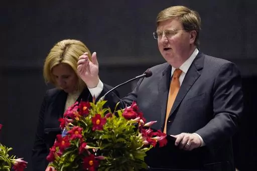 Mississippi's Republican Gov. Tate Reeves offers a prayer during a National Day of Prayer gathering at the Mississippi Coliseum in Jackson, Miss., Thursday, May 4, 2023. Reeves said Wednesday, May 17, that he has mobilized a National Guard unit to help with security at the U.S. border with Mexico. (AP Photo/Rogelio V. Solis, File)