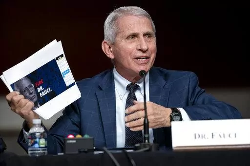 Dr. Anthony Fauci, director of the National Institute of Allergy and Infectious Diseases and chief medical adviser to the president, speaks during a Senate Health, Education, Labor, and Pensions Committee hearing Tuesday, Jan. 11, 2022 on Capitol Hill in Washington. Speaking Tuesday night, April 26, 2022, on PBS’ “NewsHour,” Fauci said the global pandemic isn’t over but the U.S. currently is “out of the pandemic phase.” But it doesn’t mean the coronavirus threat to Americans has en