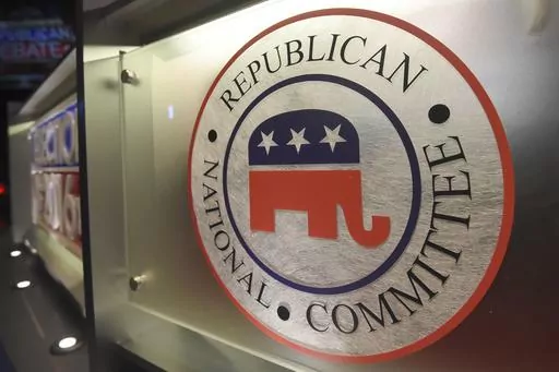 The Republican National Committee logo is shown on the stage as crew members work at the North Charleston Coliseum, Jan. 13, 2016, in North Charleston, S.C. Some Republican presidential candidates haven’t yet met polling and fundraising thresholds for the first 2024 debate, and now the stakes for making it to the second debate will be even higher. (AP Photo/Rainier Ehrhardt, File)