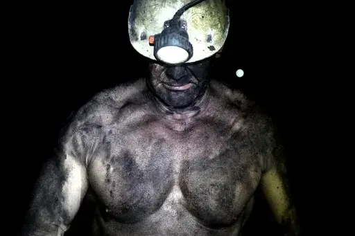 A miner walks in a shaft of the CSM coal mine in Stonava, Czech Republic, Monday, Oct. 14, 2024. (AP Photo/Petr David Josek)