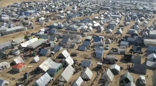 This drone image shows thousands of tents used by displaced people in Rafah, southern Gaza Strip on Friday, Dec. 29, 2023. The United Nations says tens of thousands of Palestinians streamed into the already crowded town at the southernmost end of Gaza in recent days. They are fleeing Israel’s bombardment of the center of the strip. (AP Photo)