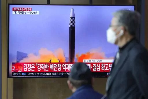 People watch a television screen showing a news program reporting about North Korea's intercontinental ballistic missile (ICBM) at a train station in Seoul, South Korea, Friday, March 25, 2022. A major United Nations meeting on the landmark nuclear Non-Proliferation Treaty is starting Monday, Aug. 1, 2022, after a long delay due to the COVID-19 pandemic, as Russia’s war in Ukraine has reanimated fears of nuclear confrontation and cranked up the urgency of trying reinforce the 50-year-old treat