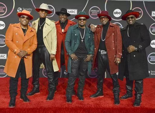 Michael Bivins, from left, Ronnie Devoe, Bobby Brown, Ricky Bell, Ralph Tresvant and Johnny Gill of New Edition appear in the press room at the American Music Awards in Los Angeles on Nov. 21, 2021. The group will perform on ABC's “New Year’s Rockin’ Eve.” (Photo by Jordan Strauss/Invision/AP, File)