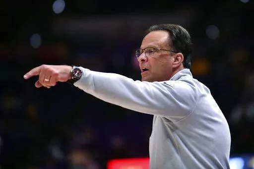 FILE -Georgia coach Tom Crean gestures during the team's NCAA college basketball game against LSU on Wednesday, Feb. 16, 2022, in Baton Rouge, La. Georgia coach Tom Crean was missing one of his assistant coaches in Saturday's 85-68 loss to Mississippi following an incident during a game earlier in the week. Wade Mason, in his first season on Crean's staff, has been suspended pending an investigation by school officials. Mason was not with the team on Saturday following a reported altercation wit