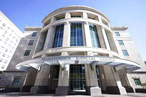 This Nov. 6, 2020, photo shows a general view of the Pennsylvania Judicial Center, home to the Commonwealth Court in Harrisburg, Pa. The Supreme Court has turned away efforts from Republicans in North Carolina and Pennsylvania to block state court-ordered congressional districting plans more favorable to Democrats. In separate orders late March 7, 2022, the justices are allowing maps selected by each state's Supreme Court to be in effect for the 2022 elections. (AP Photo/Julio Cortez, File)