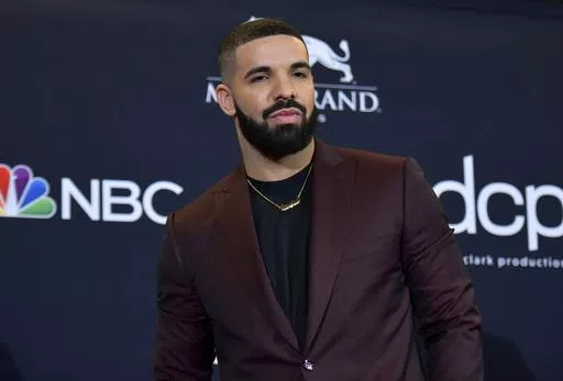 Drake poses for a photograph at the Billboard Music Awards, May 1, 2019, in Las Vegas. Hip-hop artist Drake, who had been sued for his participation in the deadly 2021 Astroworld festival in Houston in which 10 people were killed, has been dismissed from the case, a judge ruled Wednesday, April 10, 2024. (Photo by Richard Shotwell/Invision/AP, File)