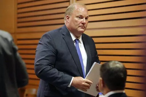FILE- Former Wisconsin Supreme Court Justice Michael Gableman leaves the stand after testifying, Thursday, June 23, 2022, at the Dane County Courthouse in Madison, Wis. The Wisconsin Assembly Republican leader who hired Gableman to investigate the 2020 election fired him Friday, Aug. 2022, just three days after the lawmaker beat a primary opponent the investigator and Donald Trump endorsed. The firing of Gableman caps a 14-month ride that saw him hired by Assembly Speaker Robin Vos to look into 