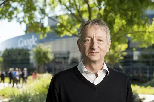 Computer scientist Geoffrey Hinton, who studies neural networks used in artificial intelligence applications, poses at Google's Mountain View, Calif, headquarters on Wednesday, March 25, 2015. (AP Photo/Noah Berger, File)