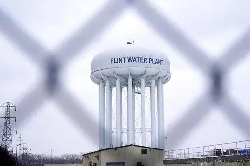 The Flint water plant tower is pictured on Jan. 6, 2022, in Flint, Mich. A judge dismissed criminal charges against former Michigan Gov. Rick Snyder in the Flint water crisis, months after the state Supreme Court said indictments returned by a one-person grand jury were invalid. (AP Photo/Carlos Osorio, File)
