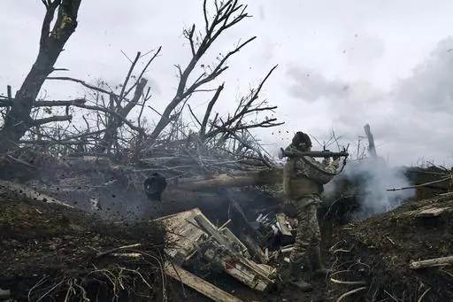 A Ukrainian soldier fires an RPG toward Russian positions at the frontline near Avdiivka, an eastern city where fierce battles against Russian forces have been taking place, in the Donetsk region, Ukraine, on April 28, 2023. Two years after Russia’s full-scale invasion captured nearly a quarter of the country, the stakes could not be higher for Kyiv. After a string of victories in the first year of the war, fortunes have turned for the Ukrainian military, which is dug in, outgunned and outnumb