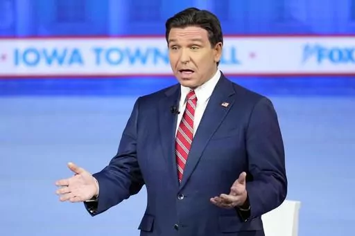 Republican presidential candidate Florida Gov. Ron DeSantis speaks during a Fox News Channel town hall Tuesday, Jan. 9, 2024 in Des Moines, Iowa. (AP Photo/Abbie Parr)
