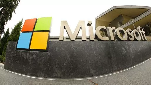 This July 3, 2014, file photo, shows the Microsoft Corp. logo outside the Microsoft Visitor Center in Redmond, Wash. In just the past month of Jan. 2023, there have been nearly 50,000 job cuts across the technology sector. Large and small tech companies went on a hiring spree in over the past several years due to a demand for their products, software and services surged with millions of people working remotely. (AP Photo Ted S. Warren, File)