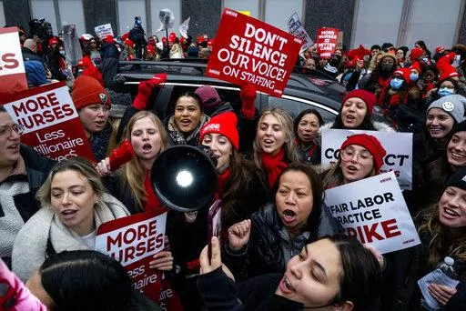 Nurses stage a strike in front of Mt. Sinai Hospital in the Manhattan borough of New York Monday, Jan. 9, 2023, after negotiations broke down hours earlier. (AP Photo/Craig Ruttle)