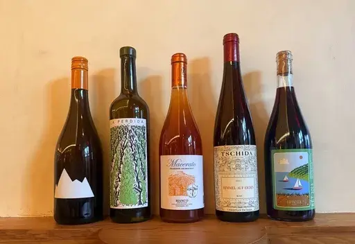 This image shows a variety of natural wines displayed at Theodora restaurant in the Brooklyn borough of New York. (Brian Rogers via AP)